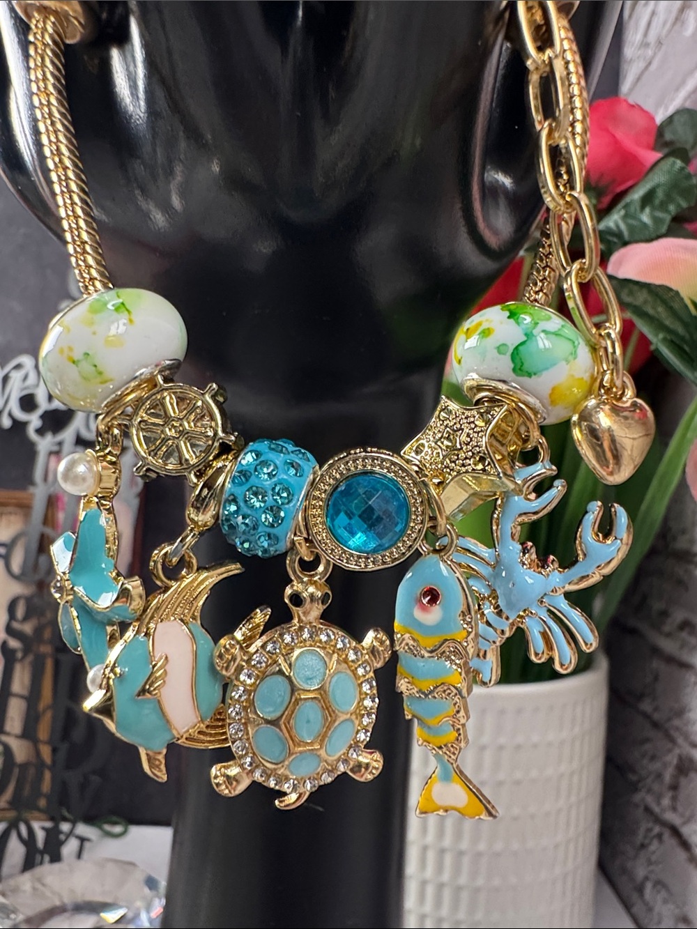 Gold-Tone Sea Life Charm Bracelet with Turquoise Blue Accents